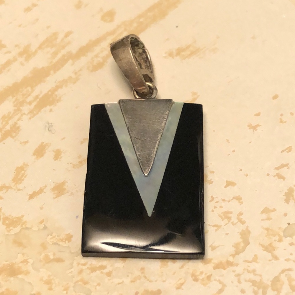 Silver and onyx pendant & a little mother of pearl
